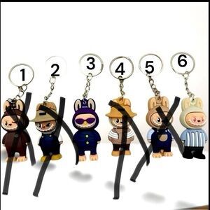 Monsters #3 and #6 left key chain choice of styles hard rubber on silver ring